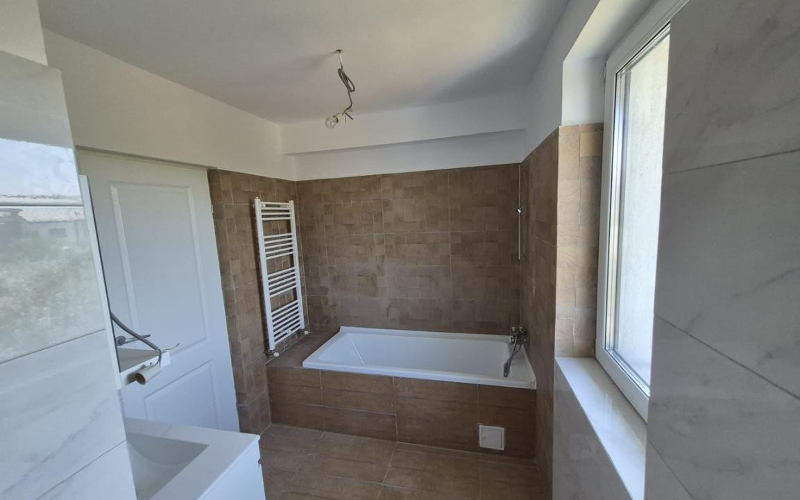 Casă tip duplex 4 camere, 96,3 mp utili, curte și parcare – Otopeni